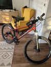 Pánské horské kolo Norco Storm 5 Orange / Charcoal 27,5” – velikost M