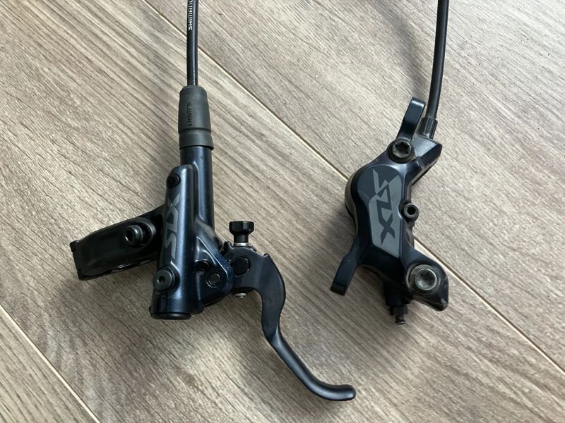 Brzdy Shimano SLX + nové metalické destičky