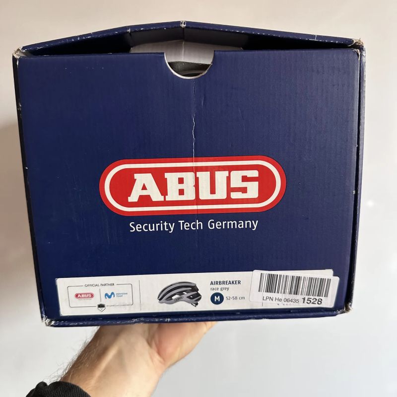 Cyklistická helma ABUS AirBreaker race grey vel. M