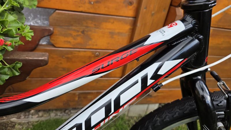 Dětské kolo 20" Rock Machine Surge 4-9let postava 100-135cm 