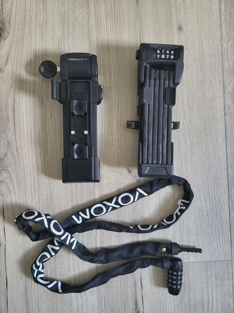 Skládací zámky (Trelock, Abus) a řetězový zámek Voxom