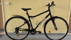 Zánovní městské trekové kolo BTWIN - Decathlon