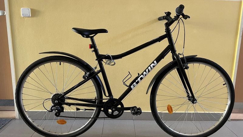 Zánovní městské trekové kolo BTWIN - Decathlon