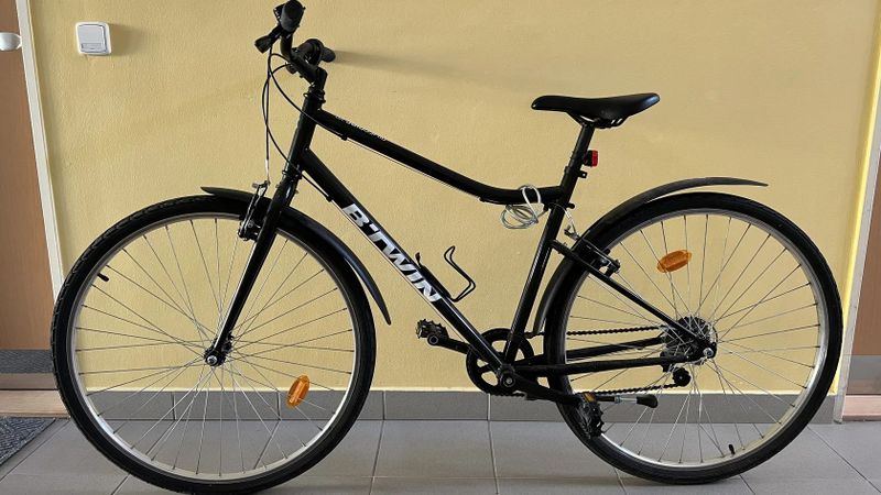 Zánovní městské trekové kolo BTWIN - Decathlon