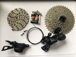 Přehazovačka Deore 10S + řetěz Campagnolo + řazení + kazeta