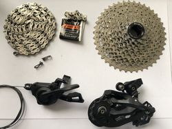 Přehazovačka Deore 10S + řetěz Campagnolo + řazení + kazeta