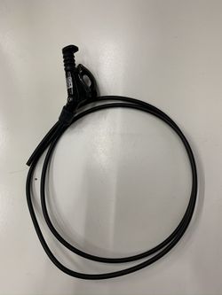 Páčka k vidlici RockShox hydraulická.