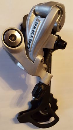 Nepoužitá přehazovačka Shimano Deore 9st.