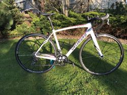 Karbonové Silniční kolo Specialized Roubaix SL4 Sport 105 velikost 54