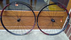 29er kola DT Swiss X 1900 Spline 29", nová, osy 15x100, 12x142 mm. ořech Sram XD