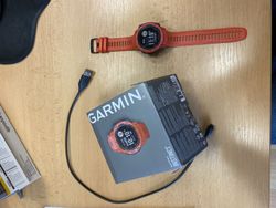 Sportovní hodinky Garmin Instinct oranžové