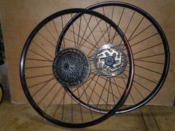 MTB zapletená kola SYNCROS 29", včetně kazety Sram 12st., převodníku 32z a brzdových kotoučů