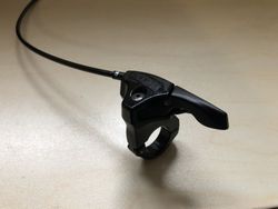 Páčka zamykání vidlice Rock Shox